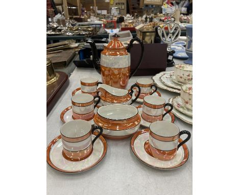 A VINTAGE STYLE ORANGE, CREAM AND BLACK LUSTRE COFFEE SET TO INCLUDE A COFFEE POT, CREAM JUG, SUGAR BOWL, CUPS AND SAUCERS 