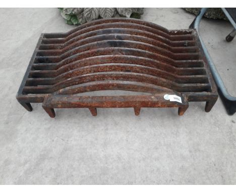 A VINTAGE CAST IRON FIRE GRATE 