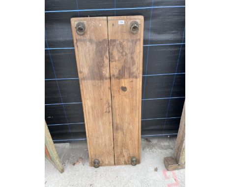 AN INDIAN HARDWOOD PANEL WITH LOOP RING DESIGN 19 X 51" 