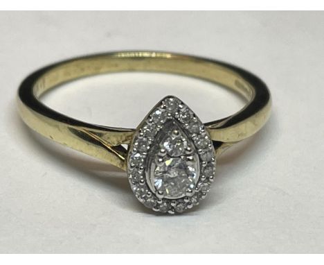 A 9 CARAT GOLD RING WITH A CENTRE TEARDROP SHAPED WHITE SAPPHIRE SURROUNDED BY DIAMONDS SIZE P 