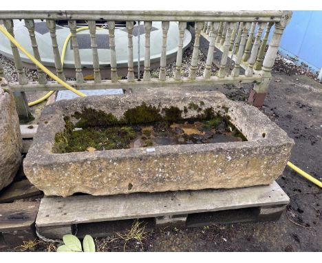 AN INDIAN STONE TROUGH 48 X 25 X 10" 