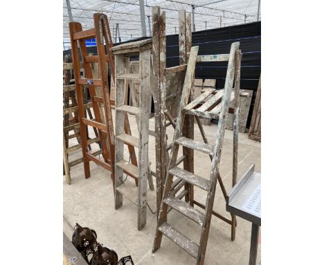 TWO VINTAGE WOODEN FOLDING STEP LADDERS 