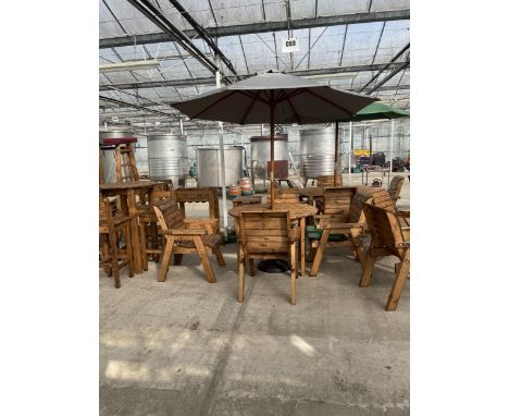 AN AS NEW EX DISPLAY CHARLES TAYLOR PATIO DINING SET COMPRISING OF A ROUND TABLE, FOUR CHAIRS, A PARASOL AND A BASE *PLEASE N