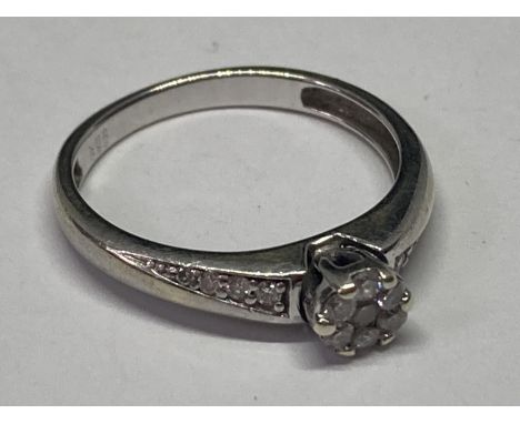 A 9 CARAT WHITE GOLD RING WITH DIAMONDS SIZE M/N 