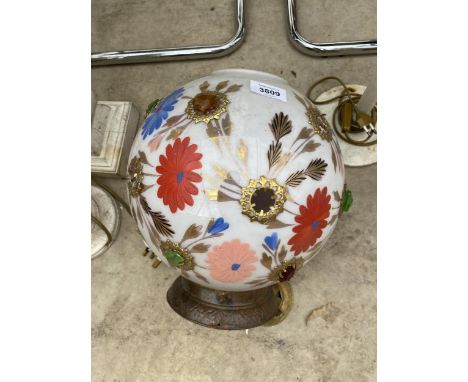 A DECORATIVE GLASS AND METAL ORB LIGHT 