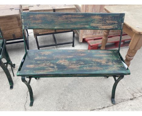 A VINTAGE HARDWOOD BENCH ON METAL BASE 