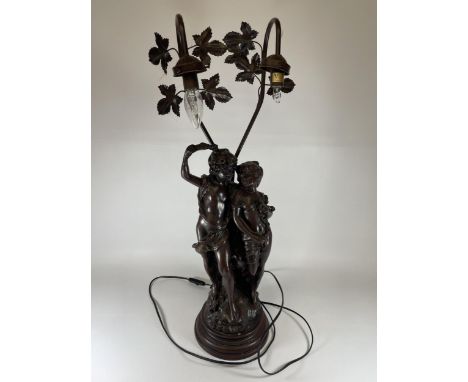 A LARGE SPELTER FIGURAL LAMP WITH FLORAL DESIGN BRANCES, HEIGHT 75CM 