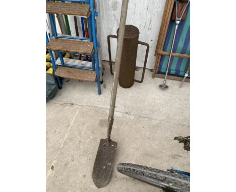 A DITCHING SPADE AND A TWIN HANDLE POST KNOCKER 