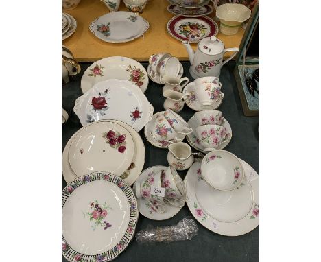 A FLORAL PATTERNED TEASET TO INCLUDE A TEAPOT, CAKE PLATE, CUPS, SAUCERS, JUGS, LARGE PLATES, ETC 