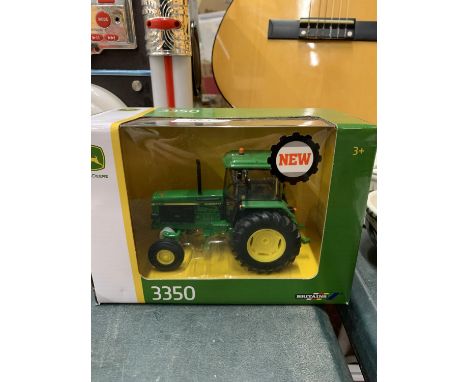 A BOXED BRITAINS JOHN DEERE 3350 TRACTOR SCALE 1:32 