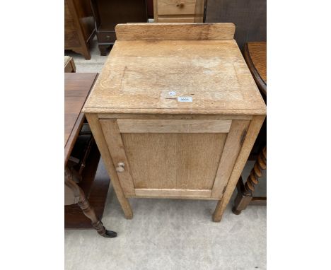 A LIGHT OAK POT CUPBOARD 