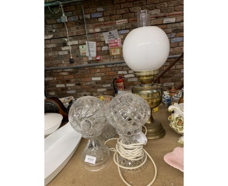 TWO CUT GLASS MUSHROOM LAMPS HEIGHT 25CM, A VINTAGE BRASS OIL LAMP WITH CHIMNEY AND OPAQUE SHADE PLUS A HEAVY CUT GLASS VASE 