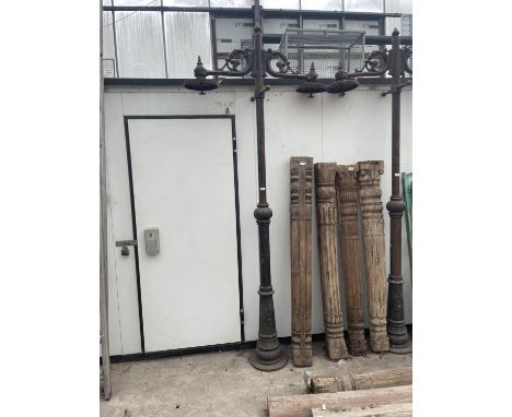 A CAST IRON TWO BRANCH STREET/ COURTYARD LIGHT 