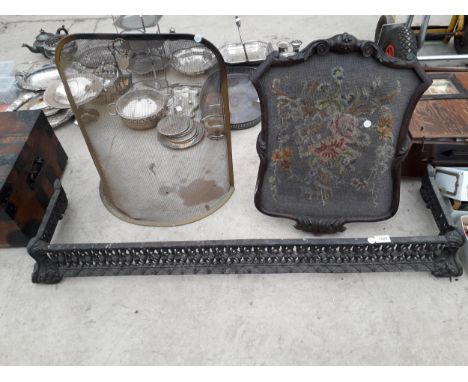 THREE VINTAGE ITEMS, A CAST IRON FIRE FENDER, A TAPESTRY FIRE SCREEN AND A FIRE GUARD 