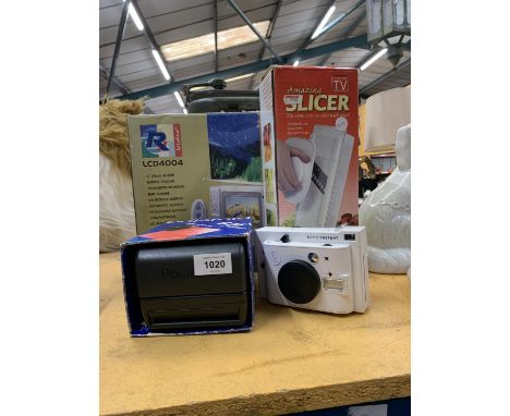 A MATRIX COLOUR TELEVISION/MONITOR TOGETHER WITH A LOMO'INSTANT CAMERA, SLICER AND POLAROID INSTANT CAMERA 