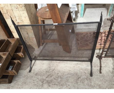 A METALWARE + MESH FIRESCREEN 