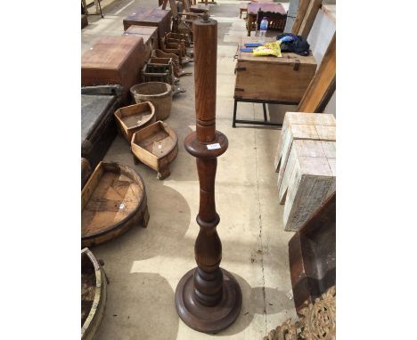 AN INDIAN HARDWOOD STANDARD LAMP 