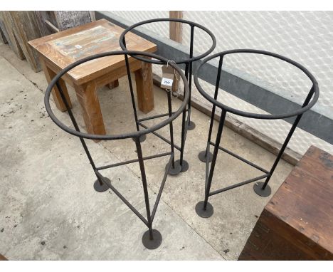 THREE CAST IRON METAL RING OUTDOOR STANDS 