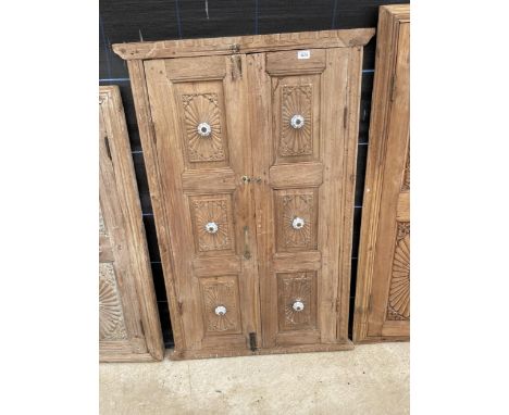 AN INDIAN HARDWOOD DOUBLE DOOR WINDOW SHUTTER WITH CERAMIC KNOB FITTINGS 33 X 51" 