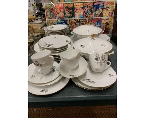 A PART BAVARIAN DINNER SERVICE TO INCLUDE VARIOUS SIZES OF PLATES, SERVING TUREENS, SERVING PLATTERS, CUPS, SAUCERS, ETC 