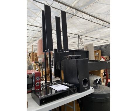 AN LG DVD PLAYER AND SURROUND SOUND SPEAKER SYSTEM 