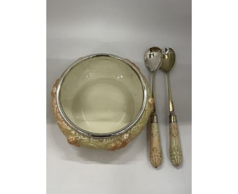 A VINTAGE BLUSH IVORY CERAMIC BOWL WITH SILVER PLATED RIM AND MATCHING SALAD SERVERS 