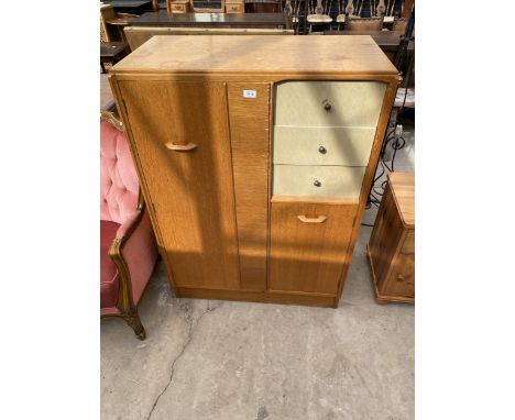 A G-PLAN E.GOMME LIGHT OAK WARDROBE/COMPACTUM, 34.5" WIDE 