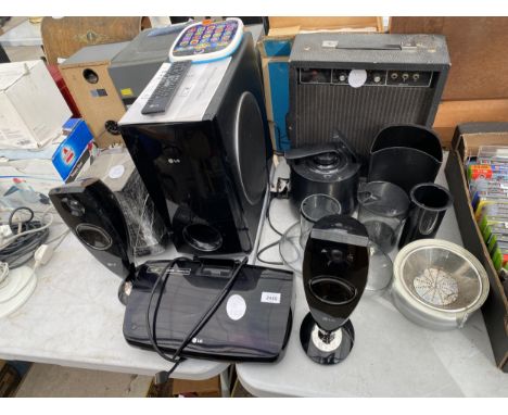 AN ASSORTMENT O FITEMS TO INCLUDE LG SURROUND SOUND SPEAKERS, AN LG DOCKING STATION AND AN AMPLIFIER ETC 