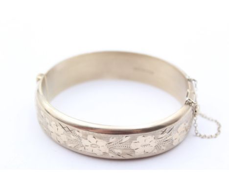 A silver gilt hinged bangle, Birmingham 1970, 30gm 