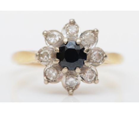 An 18ct gold sapphire and diamond cluster ring, N, 3.7gm 