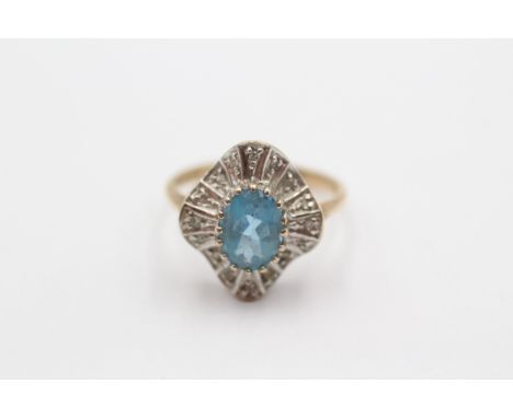 A 9ct gold blue topaz and diamond cluster ring, M 1/2, 2.7gm 