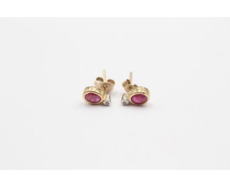 A 9ct gold ruby and diamond pair of ear studs, 0.7gm 