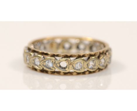 A 9ct white and yellow gold and white stone eternity ring, L, 2.5gm 