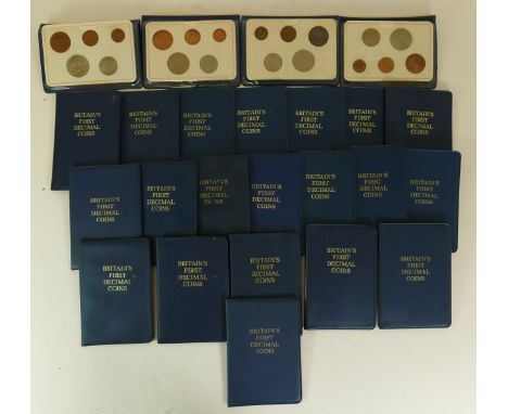 A collection of 24 Britain's First Decimal Coin sets 