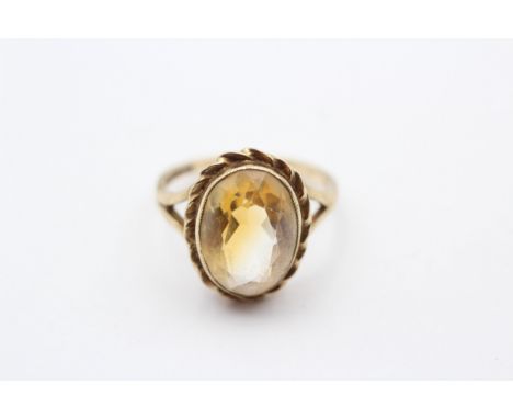 A vintage 9ct gold and citrine dress ring, stone 14 x 10mm, N 1/2, 4gm 