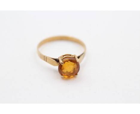 A 9ct gold and citrine single stone ring, M, 1.6gm 