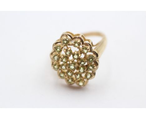 A 9ct gold and peridot cluster ring, 19 x 15mm, P 1/2, 3.8gm 