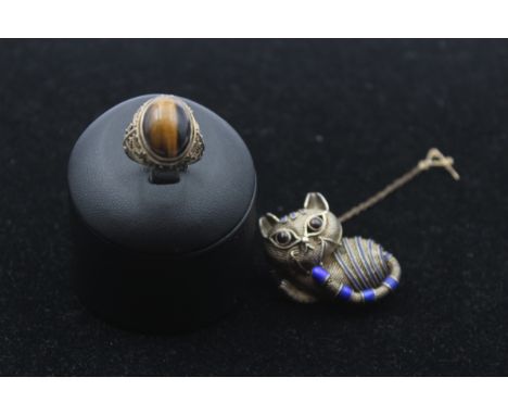 A Chinese silver and enamel cat brooch, 36mm and a Chinese silver and tigers eye ring, 23gm 