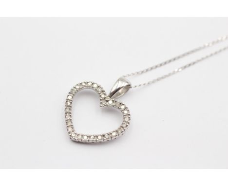 A 9ct white gold and diamond openwork heart pendant, 20 x 17mm, chain, 1.7gm 