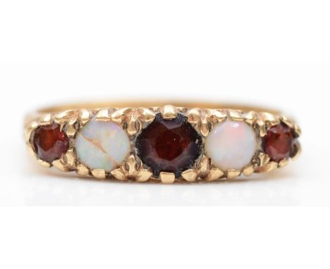 A vintage 9ct gold opal (one cracked) and garnet five stone ring, R, 3gm 