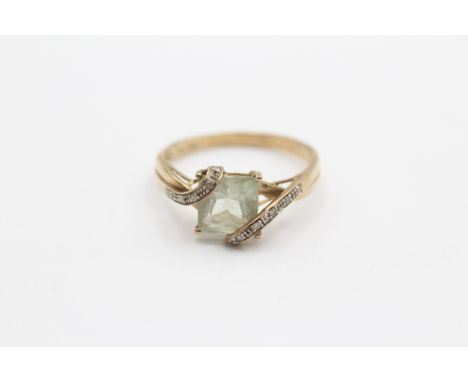 A 9ct gold green quartz and diamond set dress ring, X, 3gm 