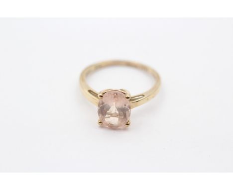 A 9ct gold and oval morganite single stone ring, J 1/2, 1.5gm 