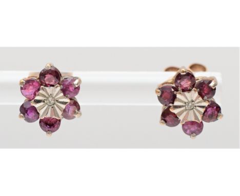 A 9ct gold ruby and diamond cluster pair of ear rings, 9mm, 2.2gm 