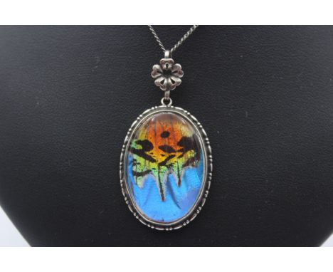 A silver and butterfly wing pendant, 49mm overall, chain, 17gm 