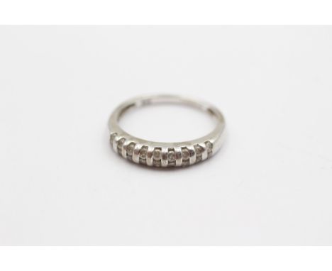 A 9ct white gold and brilliant cut diamond half eternity ring, K 1/2, 1.8gm 