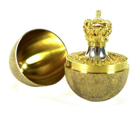 A Stuart Devlin silver gilt 'Surprise' egg, the outer textured surface opening to reveal a crown, engraved below 'Silver Jubi