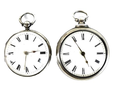 A Victorian silver pair cased pocket watch, with white enamel face, Roman numerals and gilt hands, the verge escapement movem