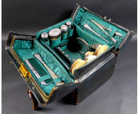 A Victorian/Edwardian Vanity case with silver dressing table wares, featuring three  Victorian silver pieces all with blank c