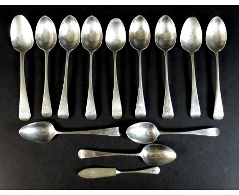 A group of thirteen pieces of George III and later silver flatware, comprising twelve old English pattern teaspoons, five var
