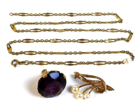 A group of 9ct gold jewellery, comprising an amethyst fob, with pierced scroll mounts, stone 20.2mm diameter, 7.5g, a delicat
